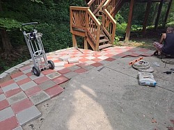 In the middle of the process of laying bricks as part of a back patio remodel in Fairfield, Ohio