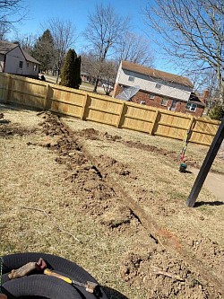 Mid installation of a French drain in West Chester, Ohio